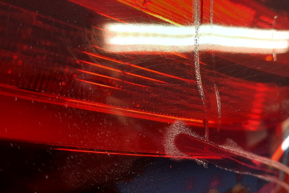 Detail of taillight repair on a Porsche Panamera