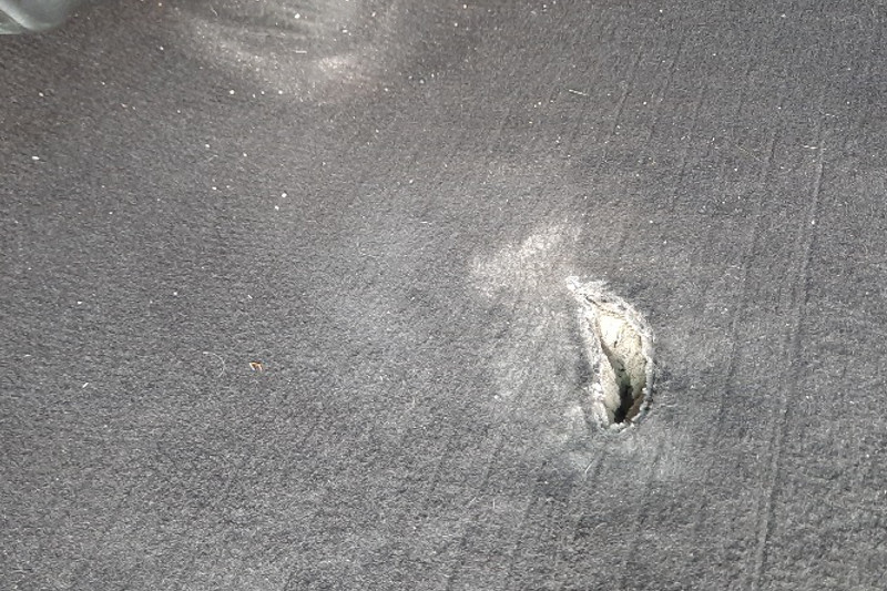 Repairing a punctured car mat