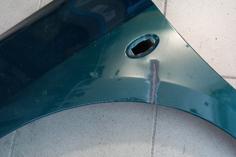 Repair of a cracked plastic fender