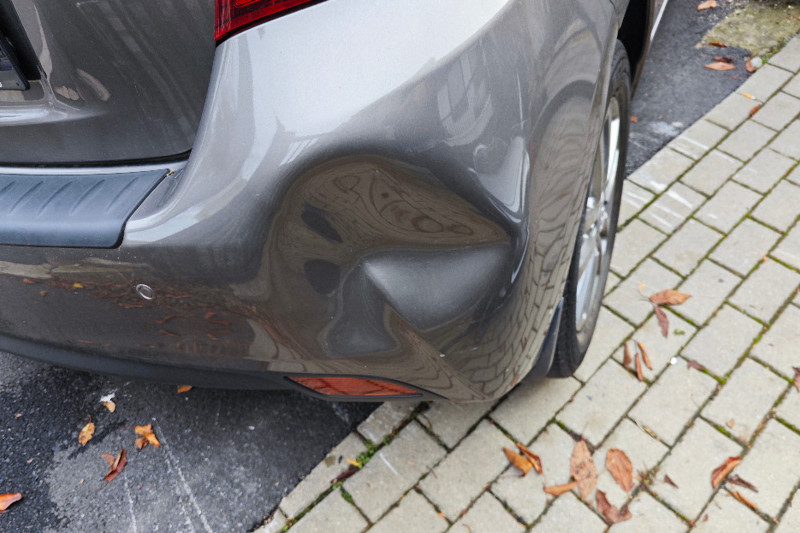 Photo gallery, dented Toyota bumper
